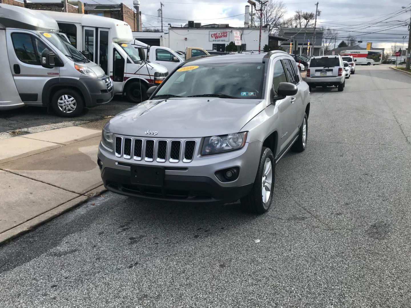 2016 Silver /Gray Jeep Compass Sport (1C4NJDBB8GD) with an 2.4 V4 engine, Automatic transmission, located at 577 Chester Pike, Prospect Park, PA, 19076, (610) 237-1015, 39.886154, -75.302338 - Photo#2